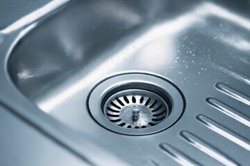 Obraz premium Stainless steel sink with drain
