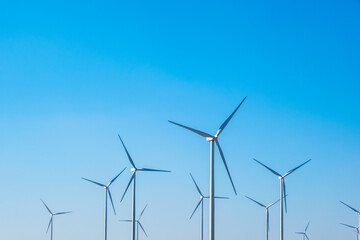 Wind farm on the mountain on blue sky day wind energy concept alternative energy Renewable energy	
