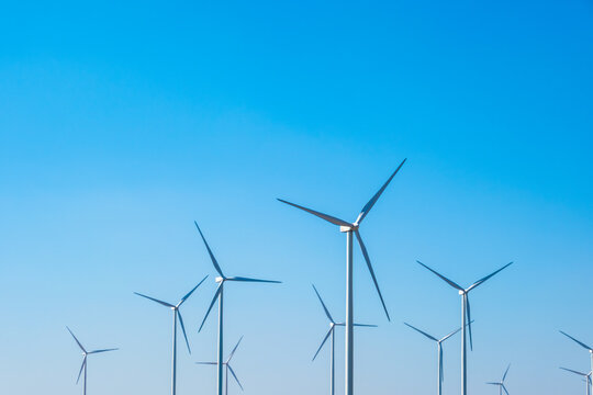 Wind farm on the mountain on blue sky day wind energy concept alternative energy Renewable energy	
