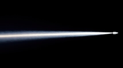 Fototapeta premium A spray of a fine mist against a dark background.