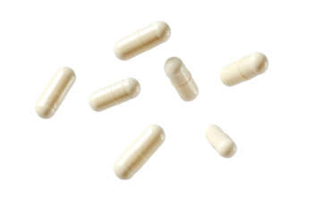 Cream-colored capsules scattered