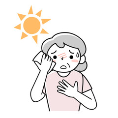 炎天下で熱中症の危険がある高齢の女性