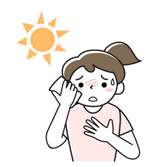 炎天下で熱中症の危険がある女性