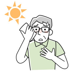 炎天下で熱中症の危険がある高齢の男性