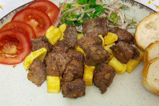 Liver pan (Albanian liver) Turkish traditional food. Liver over rice. (Turkish name; arnavut ciger) 