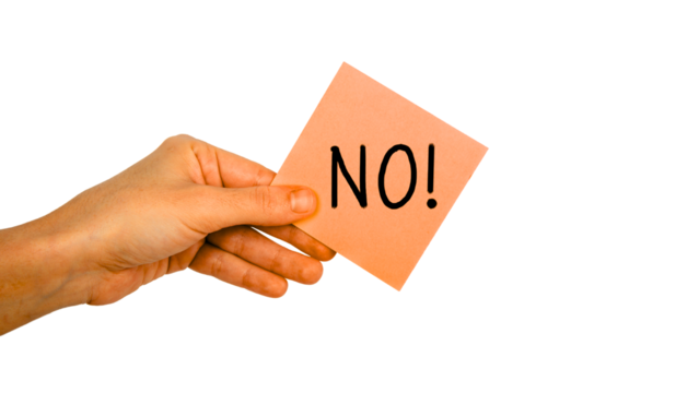 Hand Holding a "NO" Note: A person's hand is holding a note with "NO" message to convey negative emotion and disapproval.