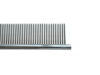 Close-up of metal comb for pets, grooming tool, isolated