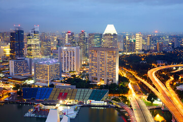 Fototapeta premium The night view of Singapore's cityscape, aerial view.