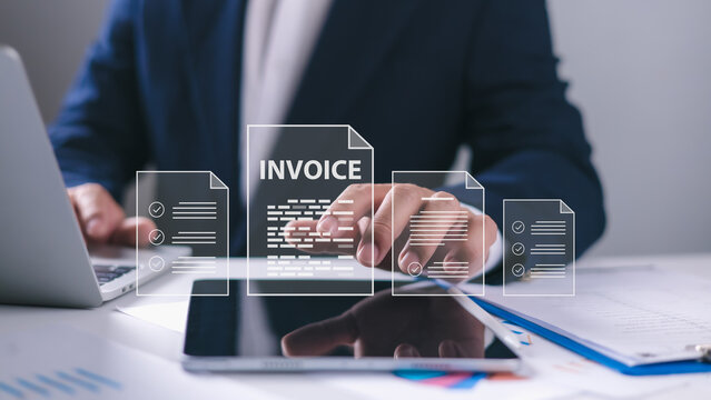 Invoice for payment, Digital invoice document, Online invoice processing and tax accounting solutions, e-invoice and Digital billing concept, Businesssman using laptop to manage electronic statements.