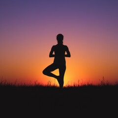 a woman doing yoga in the sunset