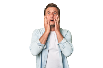 A middle-aged man isolated whining and crying disconsolately.