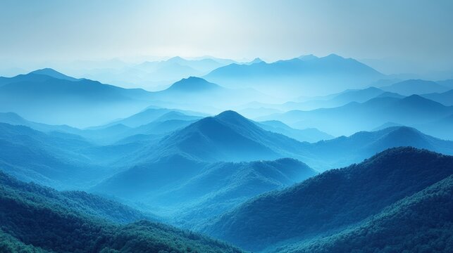 Majestic, misty mountainscapes in soft, ethereal blue tones.