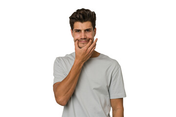 Obraz premium Young handsome caucasian man isolated on white background doubting between two options.