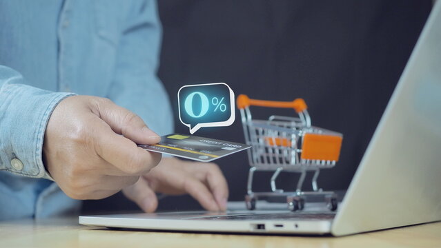  Zero percent rate in speech bubble appear when businessman using mobile smart phone and pay by credit card. 0% Interest free, zero commission.Shopping online with special offer installment payments.