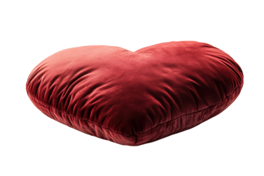 A red heart shaped pillow