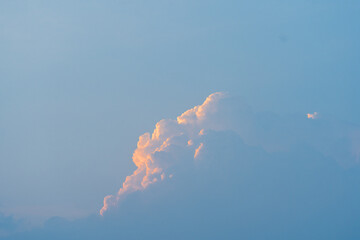 Blue Morning Sky with a Lining of Dramatic Orange Clouds