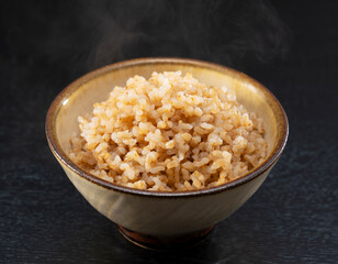 Freshly Cooked Brown Rice on a Black Background