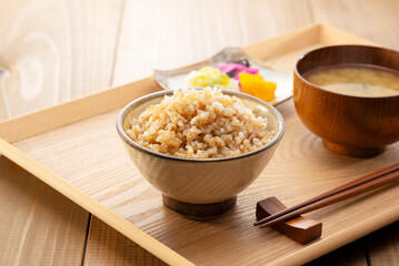Freshly Cooked Brown Rice on a Table with Miso Soup and Pickles, Japanese Breakfast Concept