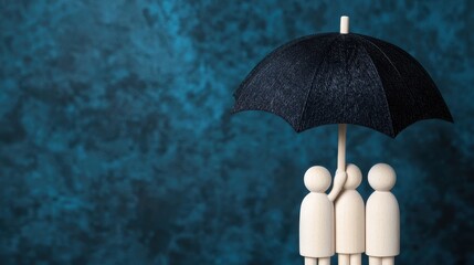 Wooden figures under dark umbrella representing protection and support in a creative artistic setting
