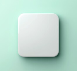 Blank, square, white button on mint background