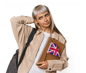 Young erasmus student with books touching back of head, thinking and making a choice.