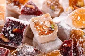 Sweet food Turkish delight, assorted rahat locum in form of cubes with nuts and powdered sugar, traditional food
