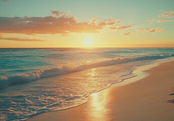 Golden sunset over turquoise ocean, soft waves on sandy beach