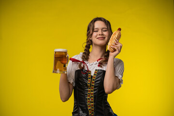 Young Woman Celebrating Oktoberfest with Beer and Pretzel