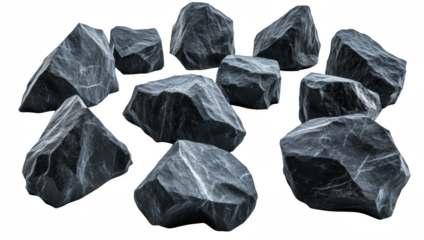 A collection of black rocks are shown in various sizes and shapes
