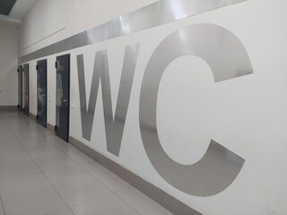 Wc doo and sign in shopping mall