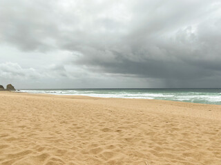 Praia da Adraga Beach with Stormy Sky and Empty Shoreline