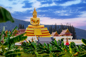 Majestic golden buddha statue at huay mongkol temple in hua hin, thailand