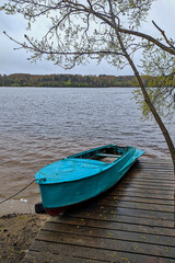 boat on the bank of a big river