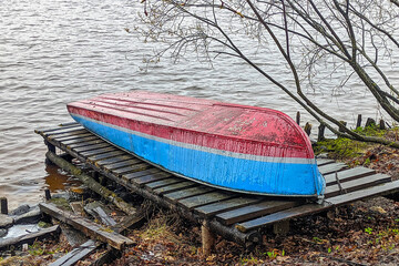 boat on the bank of a big river