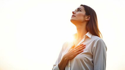 Protest young woman with hand over heart, standing with hopeful gaze toward light, symbolic pose of faith in justice, isolated white background (2).jpg