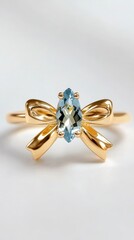Luxury Gold Bow Ring with Blue Gemstone
