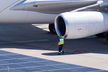 Close-up of passenger airplane Edelweiss Air Airbus A340-313 registration HB-JMF parked at Swiss...