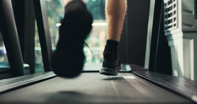 Sneakers, running and person on treadmill for fitness, sports or race training with athlete for endurance workout. Energy, speed and shoes of runner on machine, cardio or health with exercise at gym