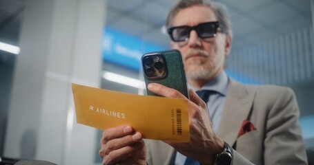 Airport Terminal: Successful Entrepreneur Scanning Airplane Ticket Using Smartphone, Checking...