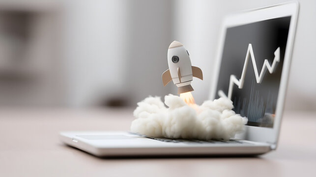 Rocket Launching from Laptop Keyboard &ndash; Startup and Business Growth Concept