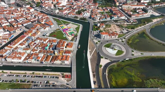 High-altitude view of central Aveiro, Portugal with urban roads, canals, buildings and wetland edges