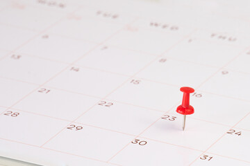 red pin stack on calendar for background