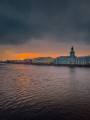 Fototapeta premium St.Petersburg, Russia. Panorama of the city. Neva, Rostral columns in winter evening.