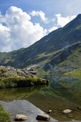 Picturesque landscape with the Balea cottage in the Fagaras mountains (Transfagarasan) - Romania.