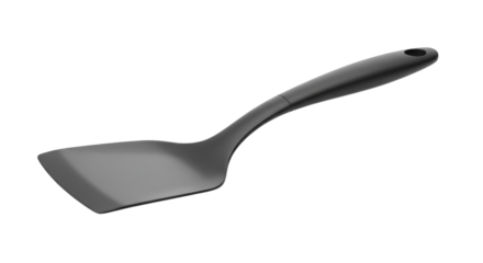 Black plastic spatula on black background