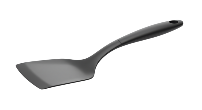 Black plastic spatula on black background