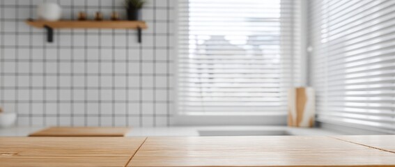 Blurred kitchen interior with an empty countertop for product display, a blurred background of a modern white and wooden kitchen interior on the wall