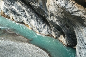 Turquoise River Flowing Through a Majestic Mountain Gorge Scenic Landscape