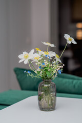 Delicate floral arrangement in a glass vase