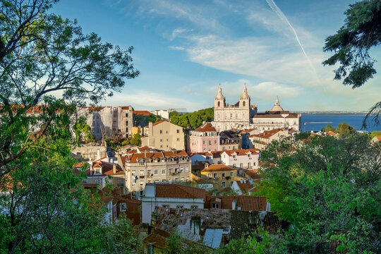 Cityscape with Monastery of Sao Vicente de Fora (Mosteiro de Sao Vicente de Fora) Framed by Castle Walls at Castelo de Sao Jorge, Lisbon, Portugal
